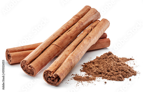 Cinnamon dried bark strips and cinnamon powder, sweet-smelling brown substance used in cooking, isolated on white background.