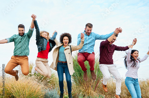 fun woman young man friendship group happy happiness jumping friend outdoor lifestyle together smiling female cheerful adult togetherness party girl jump © Lumos sp