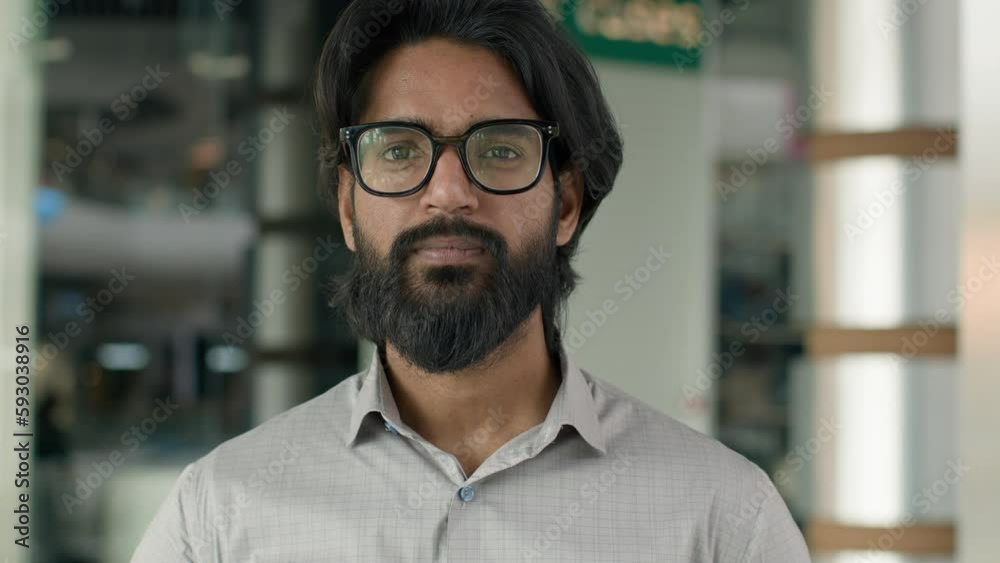 Close-up indian confident businessman looking at camera arabian bearded man entrepreneur professional sales manager leader financial advisor lawyer executive ceo posing indoors male business portrait Close-up indian confident businessman looking at camera arabian bearded man entrepreneur professional sales manager leader financial advisor lawyer executive ceo posing indoors male business portrait