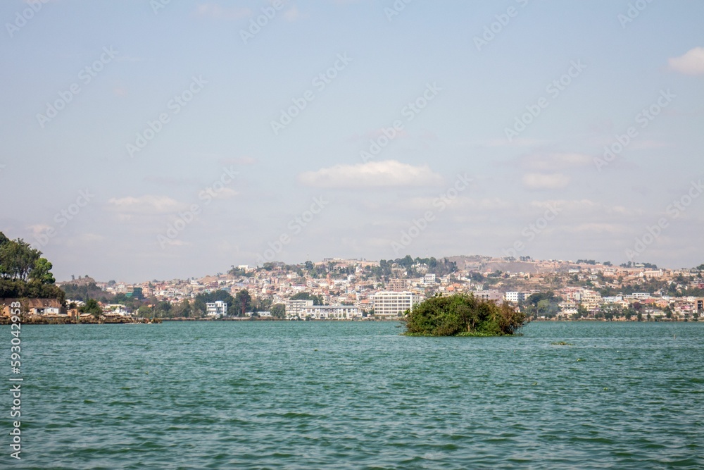 Low-angle view of modern buildings near the lake on a sunny day in Madagascar