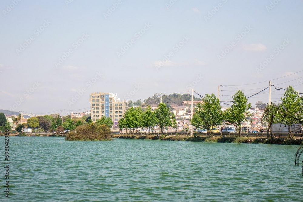 Low-angle view of modern buildings near the lake on a sunny day in Madagascar