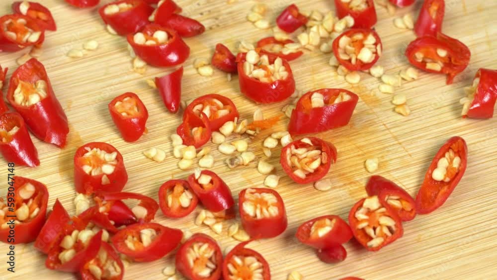 Knife Cut Chili Pepper on Wooden Cutting Board. Hot Spicy Food concept Knife Cut Chili Pepper on Wooden Cutting Board. Hot Spicy Food concept