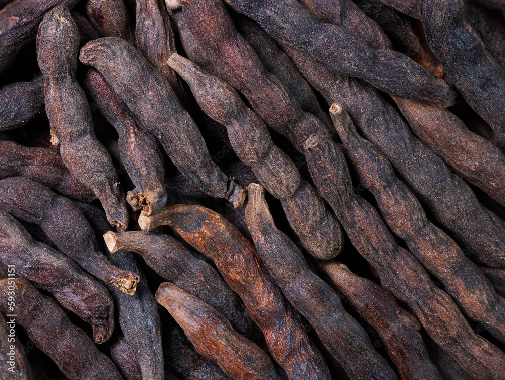 Φωτογραφία super macro shot of heap exotic spice selim pepper ,xylopia acthiopica, from Senegal in details very close
