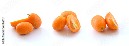 Kumquats as a set of hole and cut in half fresh ripe fruit closeup, isolated on white background. Bright “Golden orange” citruses collection. Tasty organic food, healthy diet concept. Cumquats.
