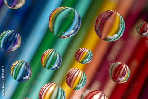 Rainbow colored drops. Abstract background close-up. wallpaper and backgrounds