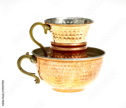 Empty copper cup isolated on white background.