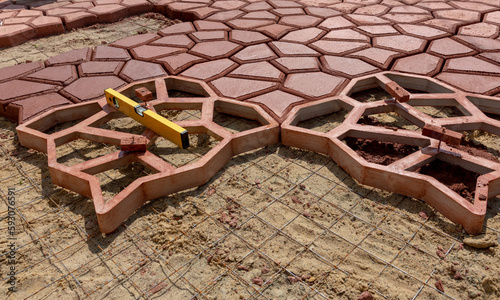 laying paving slabs using templates