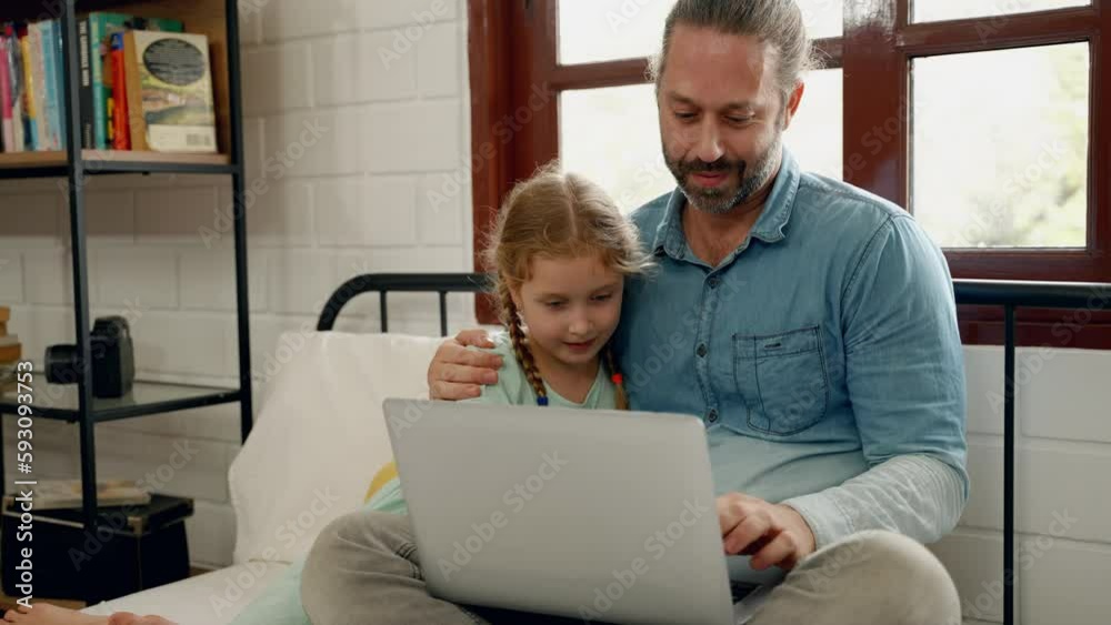 Father and daughter using laptop on bed in bedroom, education concept, family relationship
Father and daughter using laptop on bed in bedroom, education concept, family relationship