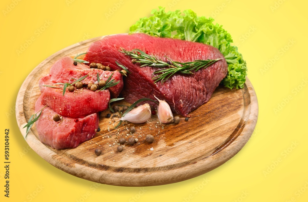 Tasty raw fresh meat on wooden board