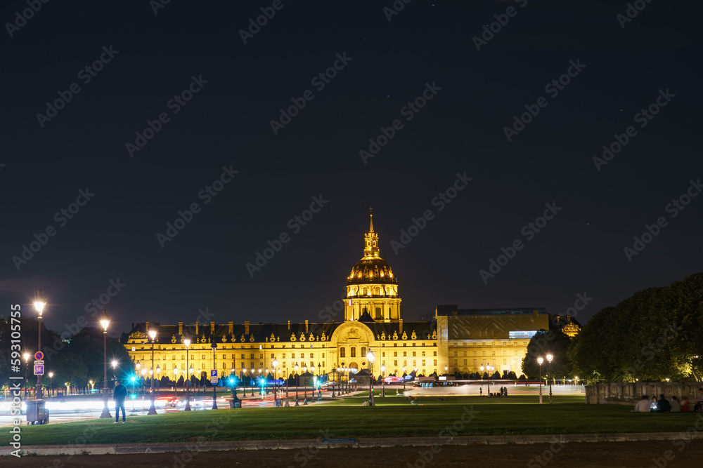 Les Invalides facade in Paris at night. France