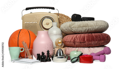 Foto Many different stuff isolated on white. Garage sale