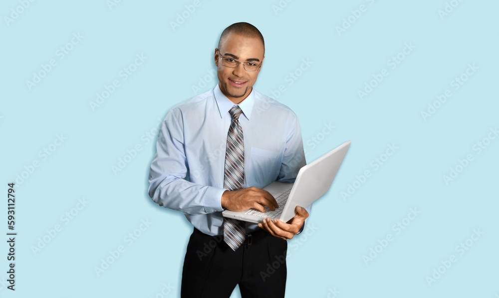 Young cheerful man hold laptop Young cheerful man hold laptop
