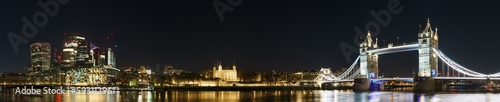 Landmarks of London panorama at night including Financial district, Tower of London and Tower Bridge