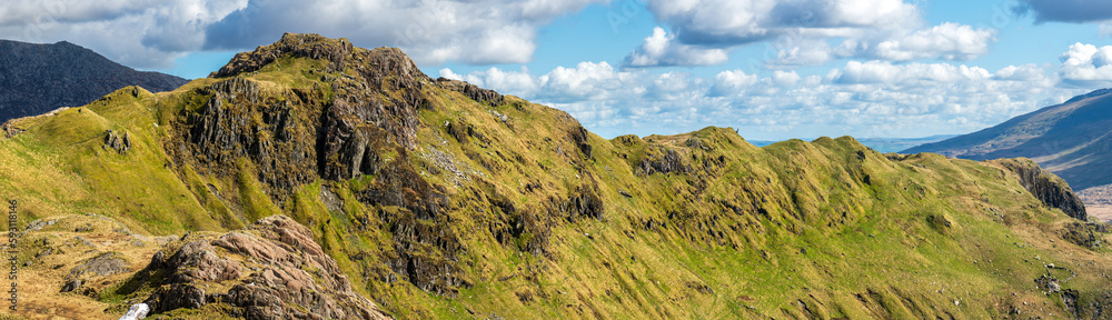 Crib Goch peak panorama on sunny day in Snowdonia. Wales