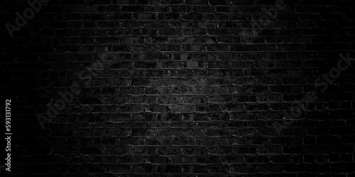 simple plain black painted brick wall