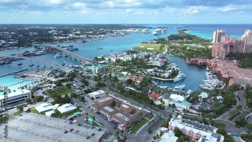 Beautiful cinematic aerial view of the Bahamas - Nassau city - cruise ship port, luxury hotels, buildings, and turquoise water oceans  photo