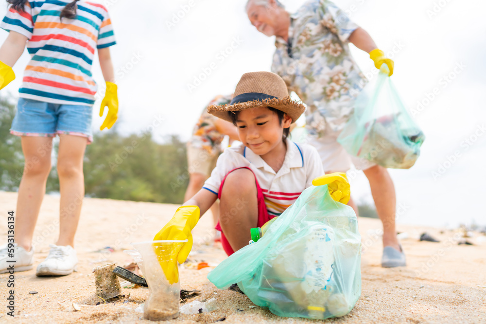 Group of Volunteers multiGeneration family picking up plastic trash
