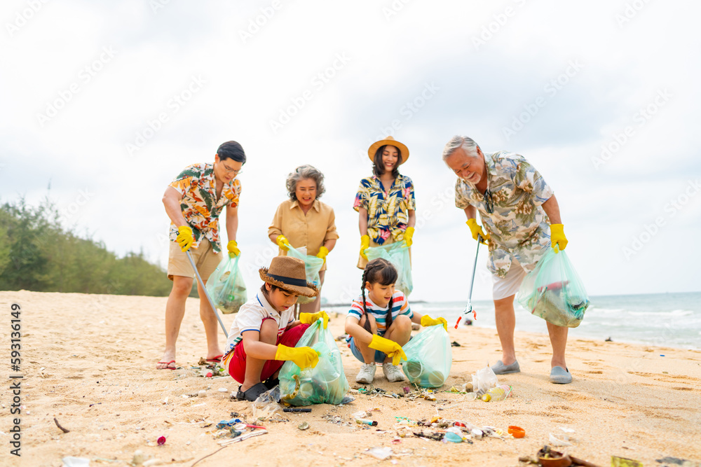 Group of Volunteers multiGeneration family picking up plastic trash