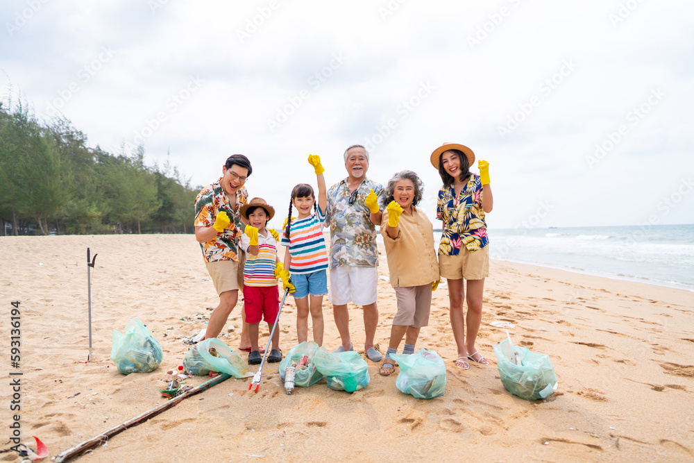 Group of Volunteers multiGeneration family picking up plastic trash