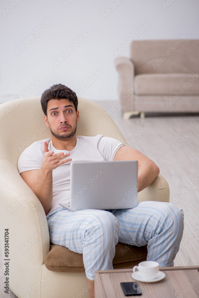 Young man starting day at home Young man starting day at home