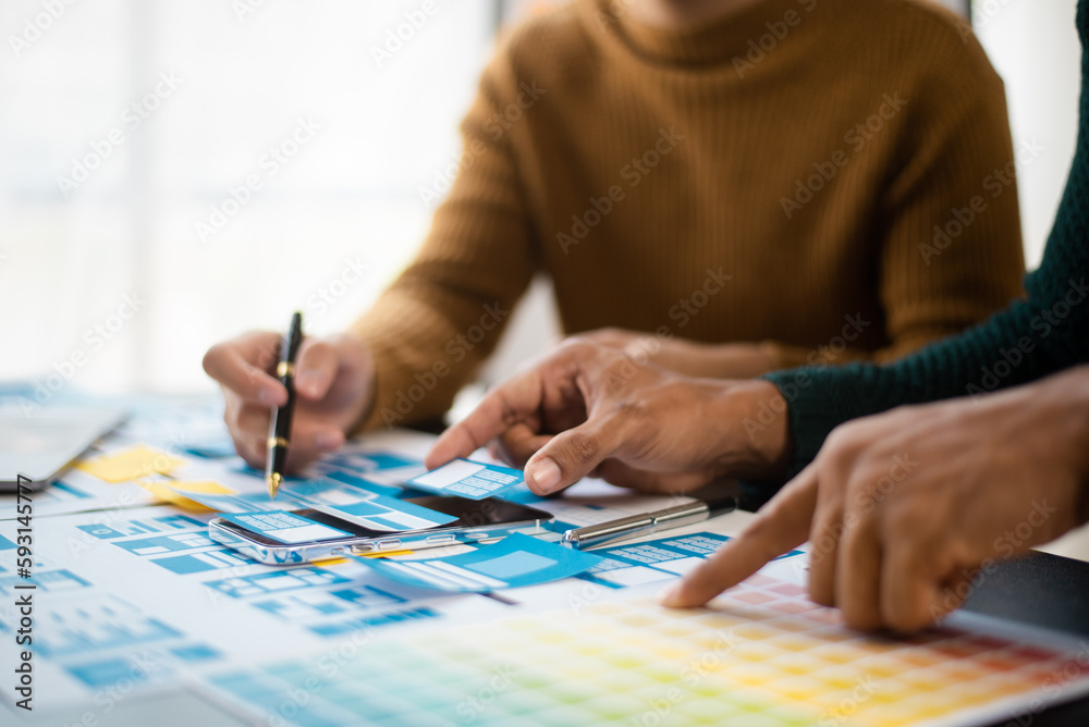 UI designer UX developer andbrainstorming about mobile app interface wireframe design with customer breif and color code. UI designer UX developer andbrainstorming about mobile app interface wireframe design with customer breif and color code.