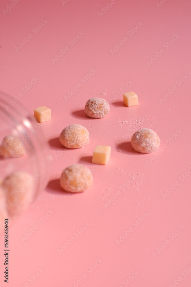 Cheese cookies in pink background Cheese cookies in pink background