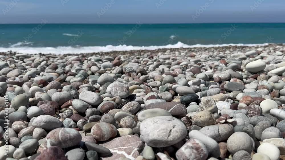 sea waves on pebble beach Stones in the Shore. 4K with voice sea waves on pebble beach Stones in the Shore. 4K with voice