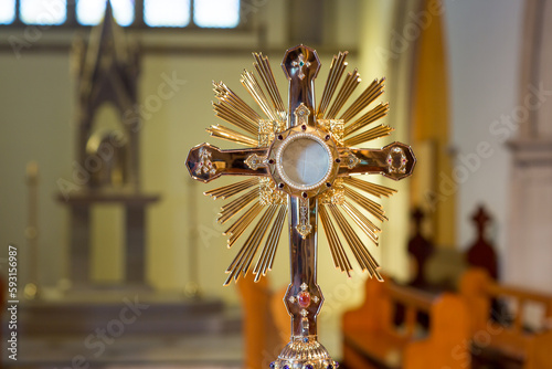 Monstrance, also called a Ostensorium in which the consecrated eucharistic host is held photo