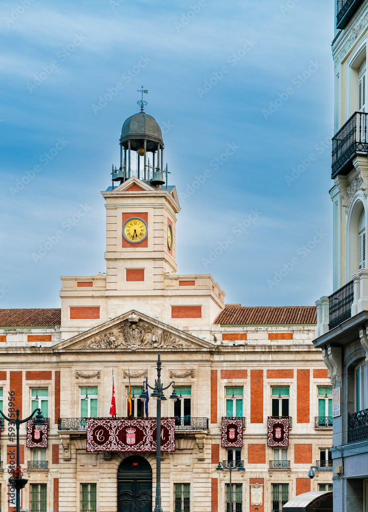 Obraz premium Puerta del sol square in Madrid, Spain with blue sky in Autumn