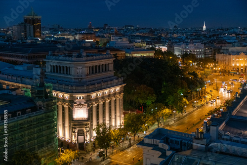 Cityscape of Madrid with Cervantes and the bank of spain at night