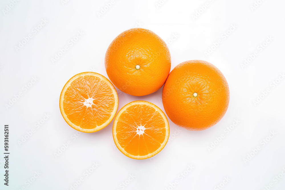 Top view of fresh whole and sliced oranges isolated on white background. Created with Generative AI Technology Top view of fresh whole and sliced oranges isolated on white background. Created with Generative AI Technology