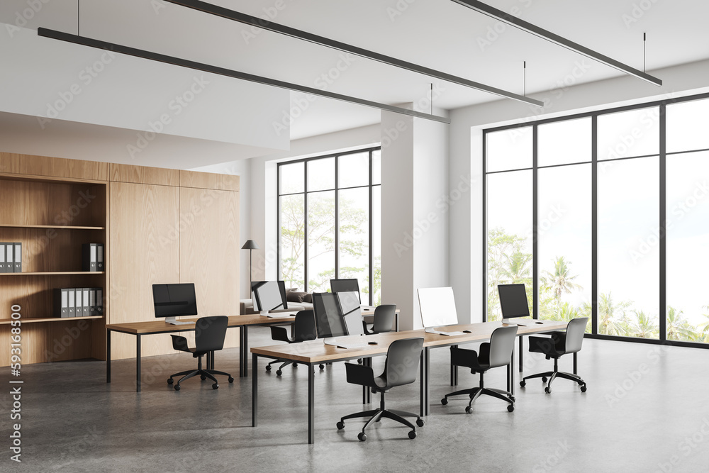 White and wooden open space office corner White and wooden open space office corner