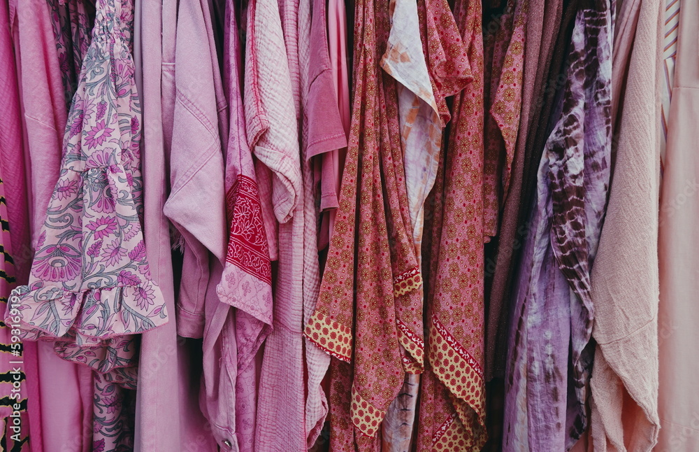 Fototapeta premium Pink Textile Fabric Dresses Clothes Shop in Israel