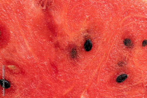 Ripe red watermelon with black seeds