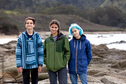 Siblings Stand Together At The Coast photo