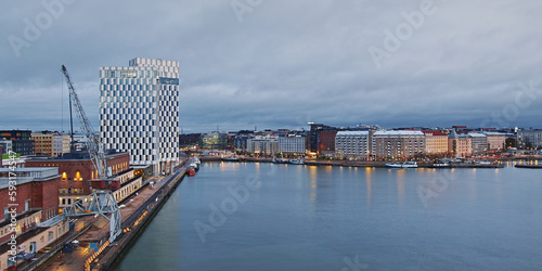 Morning in European city by sea: panoramic view of Finnish capital Helsinki, Hietalahti bay. photo