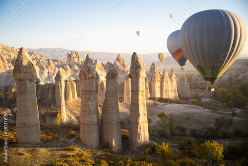 beautiful scenery flight of balloons in the mountains of Cappadocia in love valley