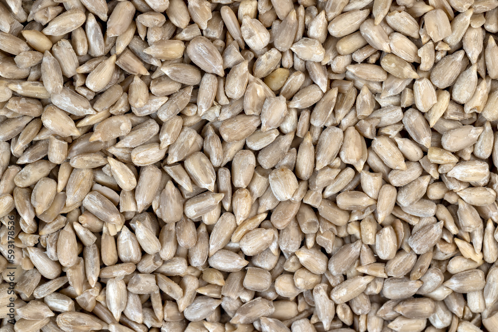 Sunflower seeds peeled from the black shell Sunflower seeds peeled from the black shell