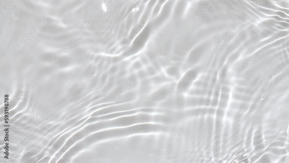 Pure water with reflections sunlight in slow motion. Water surface texture top view. Sun and shadows. Motion clean swimming pool ripples and wave. High quality 4k footage Pure water with reflections sunlight in slow motion. Water surface texture top view. Sun and shadows. Motion clean swimming pool ripples and wave. High quality 4k footage