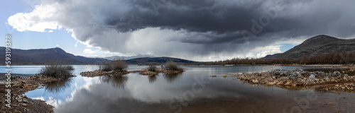 Fototapeta Naklejka Na Ścianę i Meble -  Panorama of lake before the storm, Stikada, Croatia