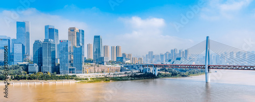 City skyline scenery with tall buildings and Dongshuimen Bridge in Chongqing, China photo