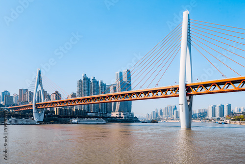 City skyline scenery with tall buildings and Dongshuimen Bridge in Chongqing, China