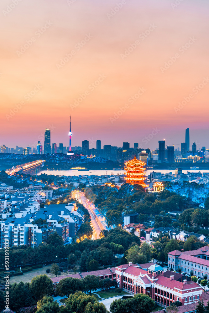 Night scenery of Yellow Crane Tower and Wuhan Yangtze River Bridge in Wuhan, Hubei, China