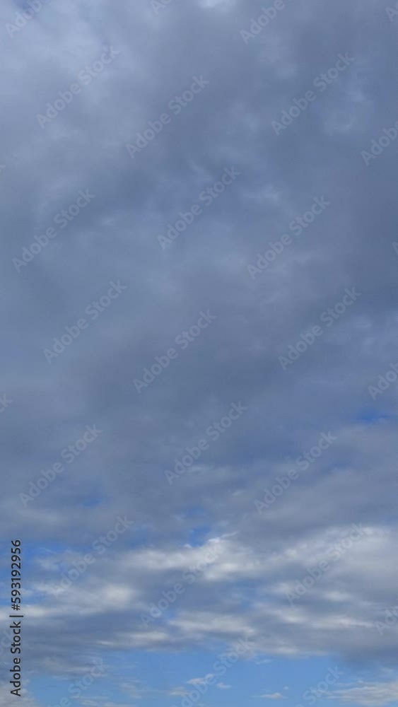 Cloudy sky before storm vertical video time lapse on a cloudy day. Cloudy sky before storm vertical video time lapse on a cloudy day.