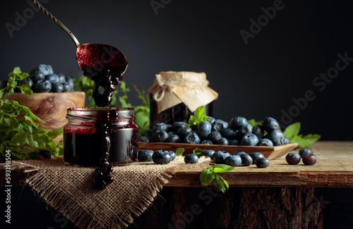 Blueberry jam with fresh berries.