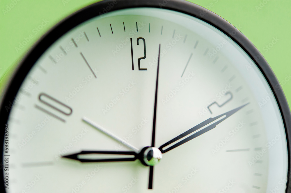 alarm clock on green background time concept working with time precious time alarm clock on green background time concept working with time precious time