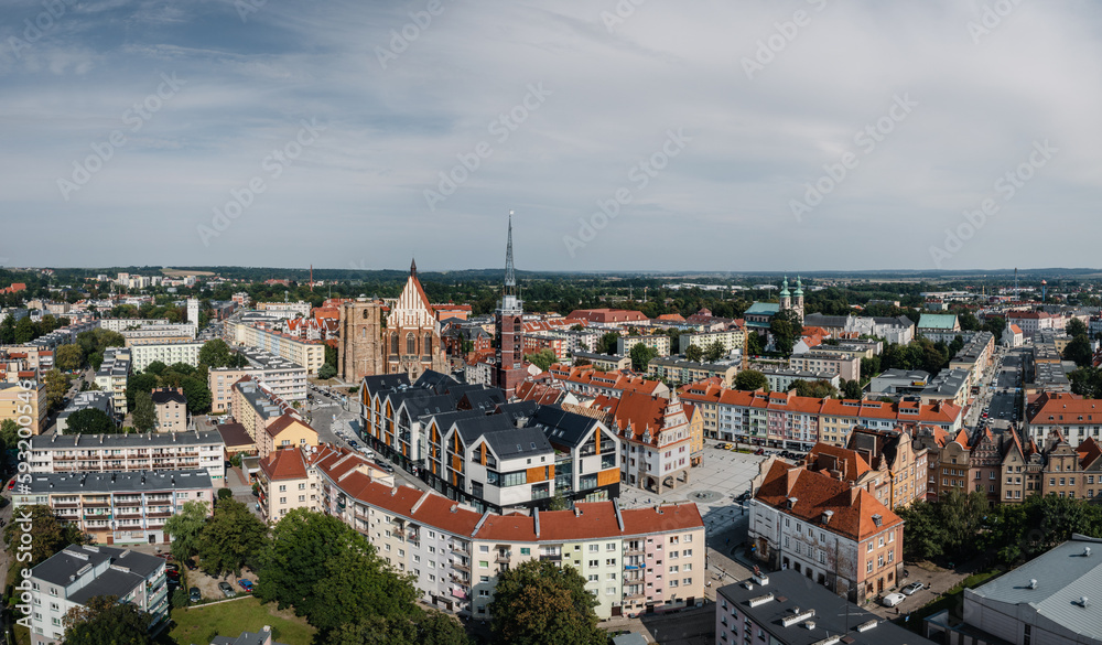 Nysa, aerial panoramic view of Nysa downtown, the main square, Town hall tower and Basilica of St. James and St. Agnes. Drone view of the oldest towns in Silesia.