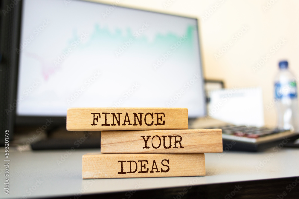 Wooden blocks with words 'Finance your ideas'. Business concept