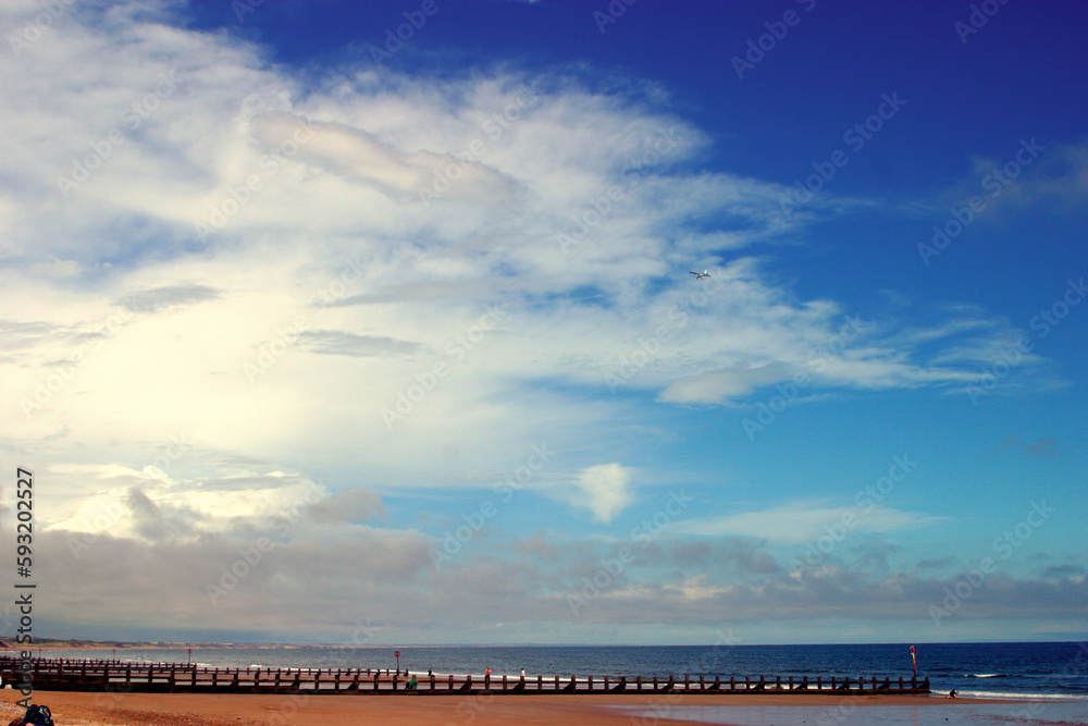 Blue sky wih clouds - Beach esplanade - Aberdeen - Scotland - UK Blue sky wih clouds - Beach esplanade - Aberdeen - Scotland - UK