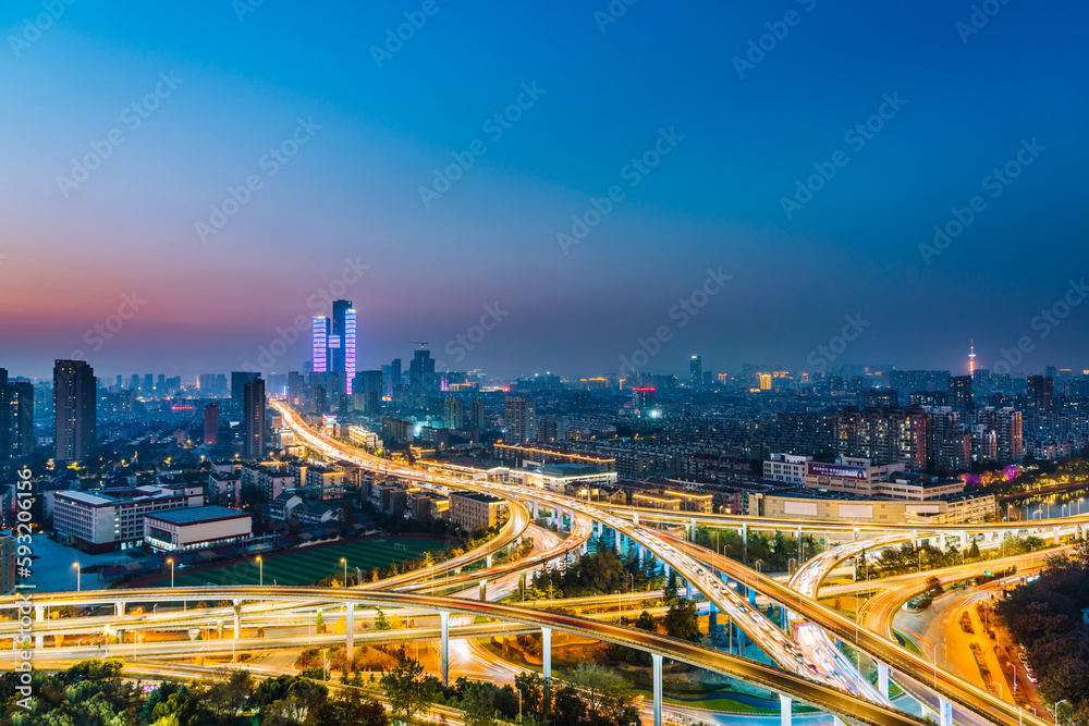 Night view of Saihong Bridge and city skyline in Nanjing, Jiangsu, China